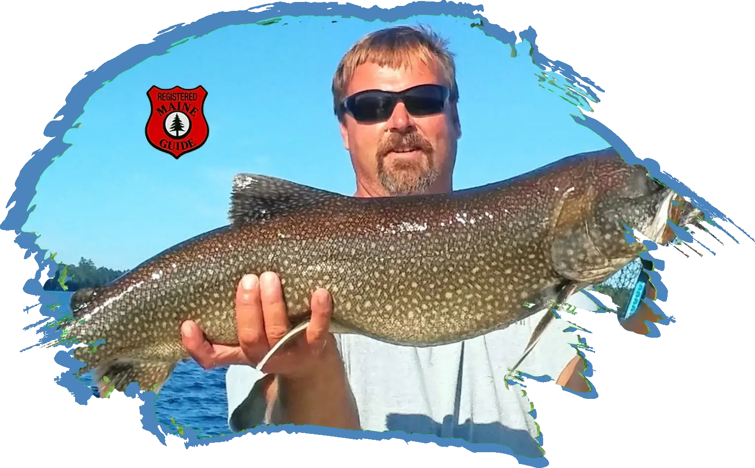 Mooshead Lake Fishing Charter Fishing Charter on Moosehead Lake - man holding up fvery large lake trout