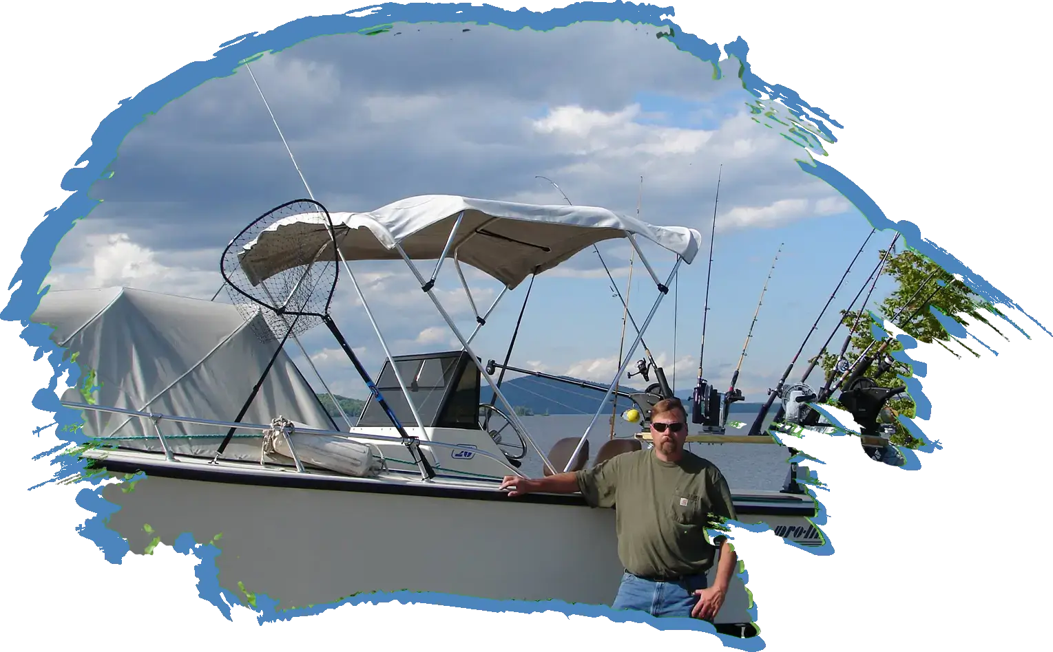 Fish Moosehead man standing in front of his fishing boat